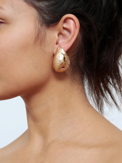 golden ovoid molten earrings