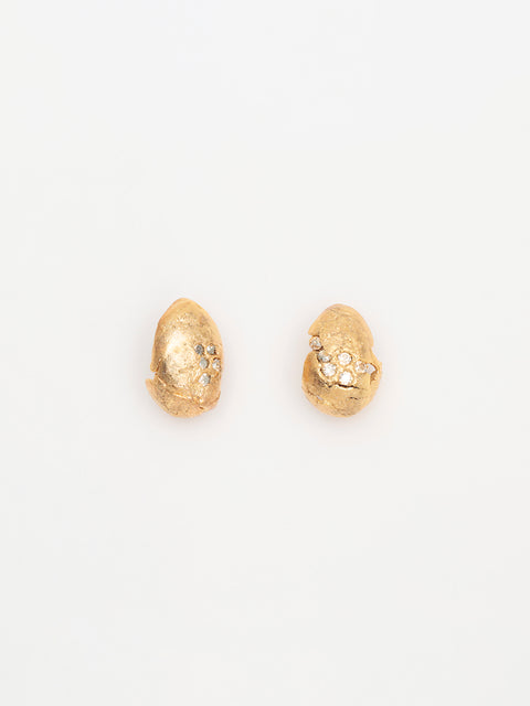 crystallized golden ovoid molten clip on earrings