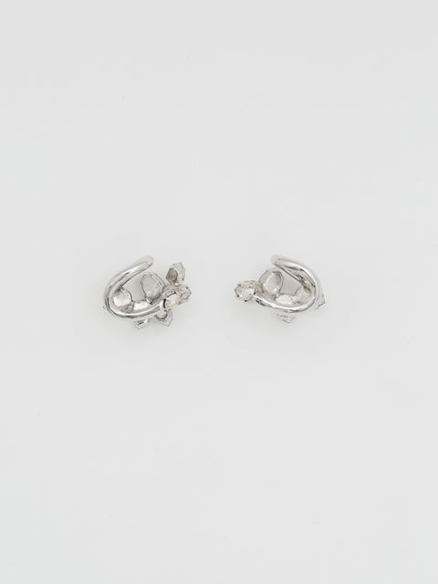 two scattered ear-cuffs