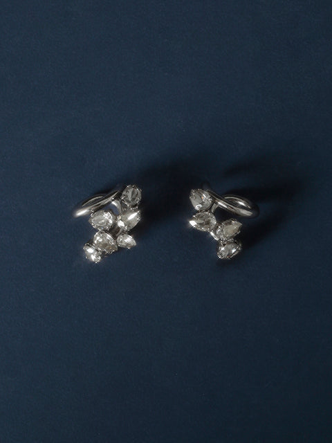 two scattered ear-cuffs