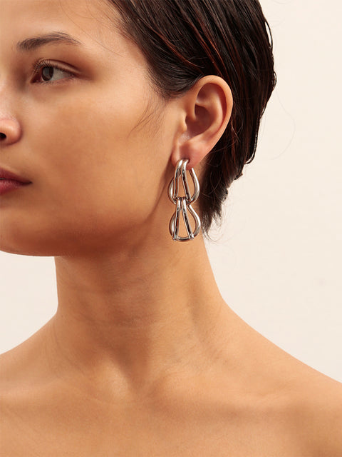 two broken links earrings