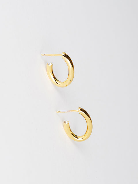solid oval hoops with crystal tip
