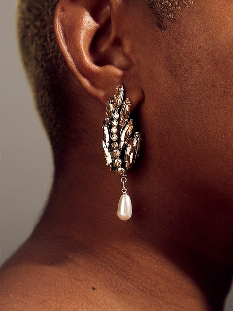 golden crystal palm frond and pearl drop half hoop earring