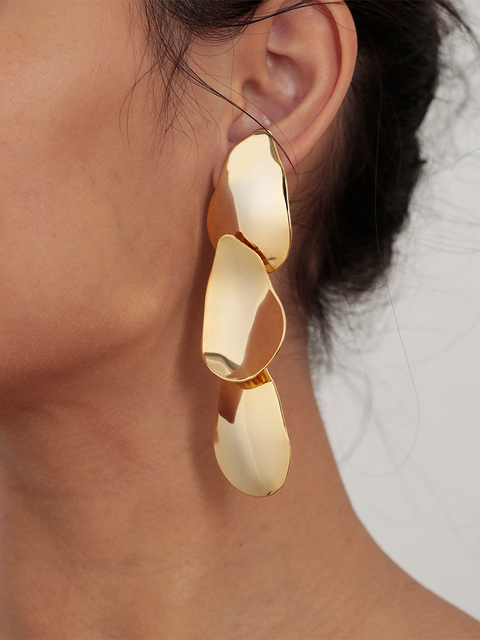 three mobile organic tear disc earrings