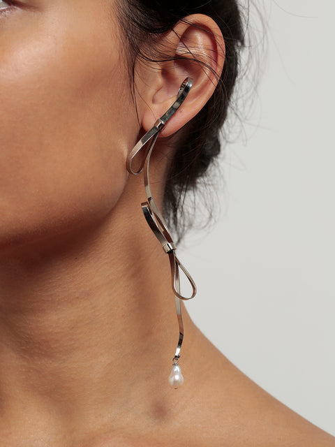 delicate bow & pearl long drop earrings