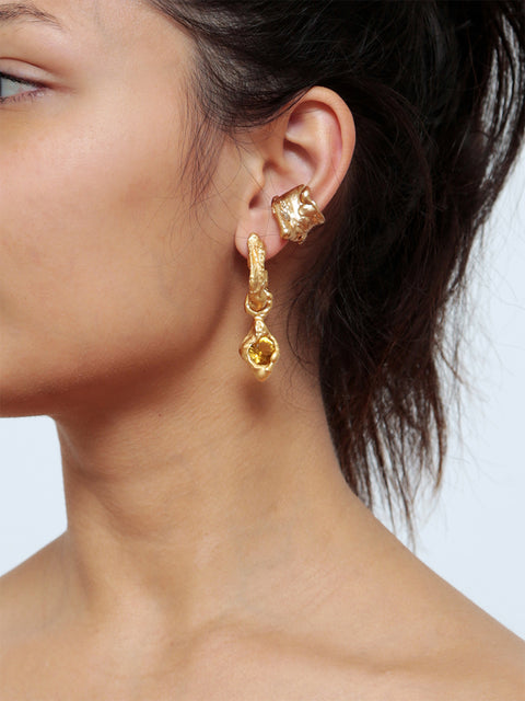 golden mismatched molten hoop earrings