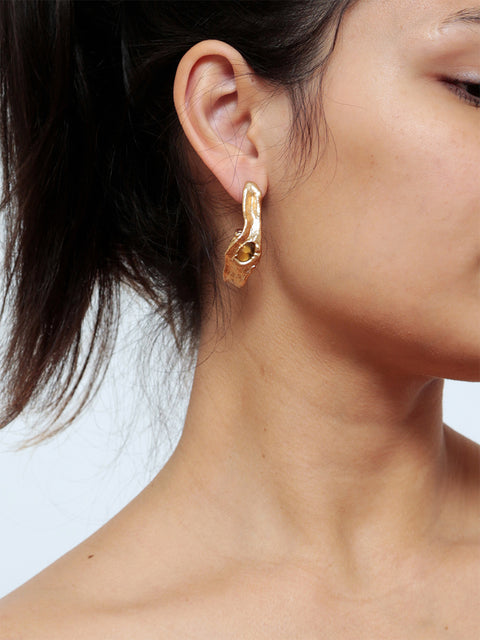 golden mismatched molten hoop earrings